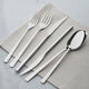 NOMO Set tacâmuri 75 piese, inox